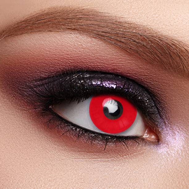 fancy and charm uv glowing red out lens applied on eyes.